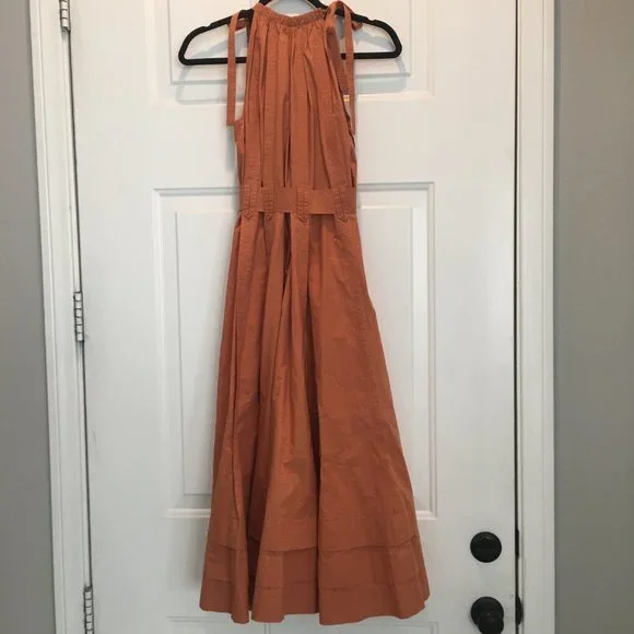 Ulla Johnson orange high neck with ties belted waist 3 layers of ruffles at hem